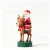 Estatueta de resina do Papai Noel transfronteiriço montado em uma rena: Papai Noel Monta em Rena Para Enviar Desejos