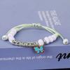 Puesto de Nochevieja joyería al por mayor Jingdezhen pulsera lote de mercancía joyería de cuerda tejida dibujos animados literarios parejas liquidación comentarios