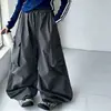 Conjunto de niña estilo coreano, nueva colección otoño 2026, top con estampado de letras y pantalones cargo de pierna ancha, conjunto de dos piezas elegante y relajado