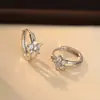 Pendientes florales transfronterizos para mujer, únicos y elegantes, nuevos clips para orejas de flor de cinco pétalos de nicho de alta gama, pendientes de moda para el día a día