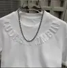 Camiseta de Manga Corta Estampada en Acero Nuevo Estilo Letra Popular Color Sólido Camisa Básica para Hombre Cuello Redondo Estilo Coreano Top Versátil