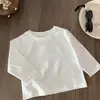 Camiseta de Manga Larga de Algodón Puro para Niñas 2026 Estilo Coreano Nueva Camiseta Básica Suave de Color Sólido para Niños, Estilo Versátil Japonés