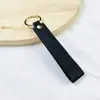 Chaveiro de PU de cor sólida transfronteiriço, cordão de mão de couro de cor doce criativo, chaveiro de carro simples para homens, atacado