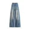 Diseño de patchwork estilo americano, jeans de corte curvo fluidos para mujer, nuevos pantalones de otoño de nicho de tiro bajo holgados de pierna ancha hasta el suelo
