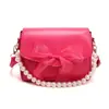 Bolso Pequeño de Cadena de Perlas para Mujer 2026 Nuevo Moderno Casual Bolso de Mano Texturizado con Lazo Bolso de Hombro Cruzado