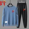 Traje Deportivo Casual de Primavera y Otoño para Hombre Estilo Europeo y Americano Estampado de Letras Juvenil Sudadera de Cuello Redondo y Pantalones Conjunto de Dos Piezas Listo para la Venta