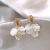 Brincos Clip-on de Espiral para Mosquitos Transfronteiriços para Mulheres Sem Piercings, Brincos de Nicho High-End, Brincos Retrô de Celebridade da Internet para Rostos Quadrados e Redondos, Acessórios de Orelha