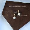 Pendientes de perlas de agua dulce de alta gama, estilo coreano, estilo frío, ligeros, de lujo, de moda, elegantes, sencillos y a la moda para mujer.