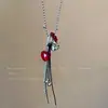 Mismo collar de piedra natural moteada multielemento de blogger para mujer, accesorios de cadena larga para suéter de otoño e invierno, colgante de corazón de uva