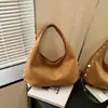 Bolsa de Ombro Feminina Estilo Coreano Transfronteiriça Nicho Rebites Estilo Motociclista Formato de Pastelira 2026 Nova Grande Capacidade para o Dia a Dia
