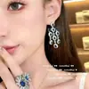 Huguang Sombra de Agua Azul Mar Profundo Denier Gema Aretes Campana de Viento Diseñador Chapado Oro de 18K Gota Zircón Collar Pavo Real