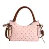 Bolso de verano con forma de dumpling, bolso de hombro versátil de nuevo estilo, bolso cruzado de moda para el trabajo 2026, bolso de un solo hombro para mujer