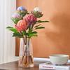Cabeza de Buda flor artificial flor artificial flor Emperador flor de seda Sakyamuni mayoreo y menudeo arte floral suave para el hogar