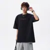 2026 Verano Bordado de Letras Diseño Casual Manga Corta Unisex Blanco Holgado Versátil Cuello Redondo Camiseta de Pareja Moderna