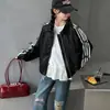 Chaqueta de cuero de otoño para niñas 2026 nuevo estilo coreano casual moderna de celebridad de internet con solapa y cordones para niños mayores