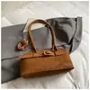 Bolso de Mujer Exquisito y de Moda 2026 Nuevo Invierno Simple Versátil Bolso de Hombro con un Toque de Lujo para Viajes de Negocios Transfronterizos
