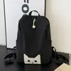 Verde lima vibrante, mochila suave y linda de gato negro, perfecta para niñas y estudiantes, con un estilo dulce y genial, adecuada para ir al trabajo, uso casual y versátil para diversas ocasiones