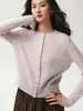 Elegante y brillante cárdigan de cachemira para mujer, con ribete de encaje, cuello redondo, mangas largas y un tejido suave y cómodo.. Una prenda exterior versátil perfecta para otoño e invierno