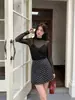 Xiu Xixi 2026 Outono Nova Blusa Elegante de Malha com Gola Redonda e Mangas Longas para Mulheres K80825