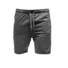 Transfronteiriço 2021 Europa e Estados Unidos calça masculina de 5 pontos cor sólida shorts esportivos casuais cintura com cordão solta calça de praia uma geração de cabelo