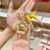 Llavero Flor de Dinero de Oro Puro 999 Colgante para Bolso Regalo para Mejor Amiga Novia Regalos al por Mayor Pequeños Regalos de Oro