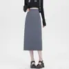 Falda gris de mujer para primavera y verano 2026, nueva falda de traje profesional de corte ajustado de cintura alta, longitud media, con abertura lateral y diseño en A
