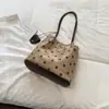 Bolso de hombro para mujer estilo coreano Ruien 2026 nuevo bolso de mano de lunares de gran capacidad bolso tipo cubo moderno