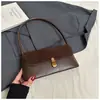 Bolso de axila retro de nicho para el commute de mujer, nuevo 2026, bolso de hombro con estampado de leopardo, bolso de mano de personalidad a la moda