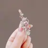 Exquisita Horquilla de Corazón Dulce con Perforaciones de Agua para Cabello Femenino Diseño de Nicho Sentido de Diseño Pinza Lateral Flequillo Cabello Suelto Horquilla Elegante Tocado