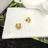 Pendientes de concha de moda transfronterizos, estilo europeo y americano, populares en Internet, de acero inoxidable bañado en oro de 18 quilates, pendientes personalizados de alta gama para mujer, venta al por mayor
