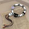 Pulsera de Cuerda Tejida de Cerámica de Gato Calavera Diseño de Nicho Femenino Dulce Fresco Estilo Chino Borla Pulsera de Color