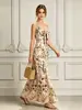 Vestido largo retro pastoral europeo y americano de 2026 con estampado floral, cuello en V y cintura ceñida, perfecto para un look de vacaciones