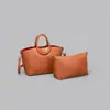 Bolso de mano de moda con patrón de lichi de lujo ligero transfronterizo, bolso de hombro vintage de alta gama para el trabajo, bolso tote estiloso de diseño nicho