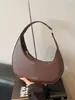 Bolso de mano tipo dumpling de diseño de nicho transfronterizo, nuevo modelo de verano 2026, bolso de axila versátil de alta gama, bolso de mano y bolso cruzado a la moda