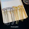 Pendientes de plata con baño de oro real de 18 quilates, aguja de plata, borla de lazo de circonita, pendientes de lujo ligero de alta gama, accesorios de oreja exquisitos y a la moda