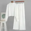 Cross Europe 2026 Outono/Inverno Novo Conjunto de Tricô com Cardigan de Zíper e Calça de Barra Reta com Temperamento Simples Versátil para Mulheres