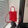 Bolsa de ombro única fofa e delicada com poá, bolsa para celular, nova bolsa quadrada pequena versátil de nicho, bolsa transversal casual