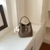 Bolso de Mano de Oficina Transfronterizo de Moda para Mujer, Nuevo Estilo 2026, Bolso Cubo de Hombro Cruzado de Moda para Verano