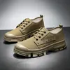 Zapatos de trabajo nuevos 2026, zapatos de lona casuales y duraderos, zapatos de caña baja estilo Martin, zapatos para hombre de moda estilo británico con suela gruesa