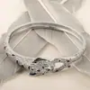 Nuevo brazalete de moda transfronteriza de personalidad europea y americana, con incrustaciones de circonita de diamante completo, apertura de cola de leopardo, chapado en oro real