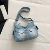 Bolsa transversal casual de brim lavada com múltiplos bolsos estilo coreano transfronteiriça 2026 nova tendência versátil moda bolsa transversal para mulheres
