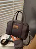 Bolsa de tela estilo coreano 2026 nueva casual versátil para mujer bandolera bolso de mano mini exquisito bolsa tote pequeña