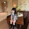 Vestido a Cuadros con Cuello de Muñeca Elegante para Niñas 2026 Verano Nueva Moda Vestido Dulce con Mangas Abullonadas Infantil Moderno