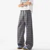 Pantalones casuales rectos holgados de cuadros con cintura elástica de estilo retro americano, pantalones de pierna ancha, blanco y negro