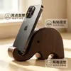Soporte creativo de madera maciza para teléfono con forma de elefante, un soporte perezoso para tu escritorio, un soporte multifuncional para tableta y pieza decorativa