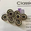 Fornecimento Atacado Galvanoplastia UV Moda Fivela a Laser Dourado Ferry Preto Padrão Estético Moda Estética Botão de Camisa Masculino e Feminino