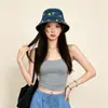 Sombrero de pescador de mezclilla de diseño de nicho europeo y americano para mujer, sombrero de pescador bordado primavera/verano 2026, sombrero para viajes al aire libre que hace que la cara se vea más pequeña