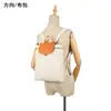 Mochila de Design Novo Original Adequada para Homens e Mulheres, Lona com Detalhes em Couro, Bolsa de Viagem Casual de Cor Sólida, Mochila Escolar