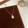 Nuevo Colgante Minimalista Exquisito Ovalado Collar Simple Versátil Diseño de Nicho Personalidad de Alta Gama Lujo Ligero Cadena para Clavícula