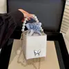 Bolsa quadrada pequena minimalista, nova bolsa de mão outono 2026 com corrente de pérolas, bolsa de ombro e transversal pequena estilosa para mulheres